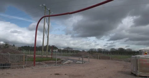 Height restriction barrier near overhead electricity power lines Stock Footage 332253041