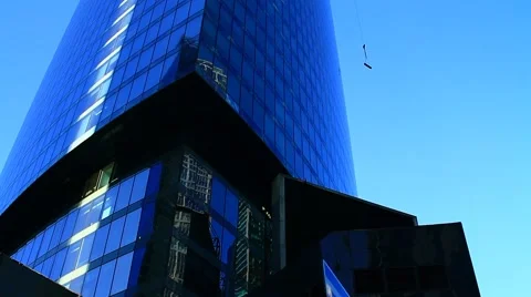 From the height of a skyscraper hoist down construction material. Stock-Footage 53983078