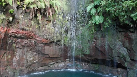 The height of the waterfall on the island. Drone Stock Footage 120742718