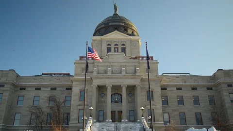 Helena, Montana - March 28, 2020: Montana State Capitol building close up pan Stock Footage