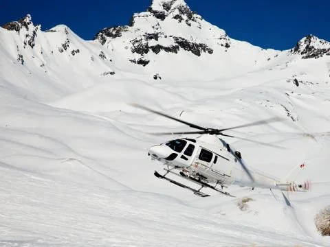 Heli-skiing Stock Photos
