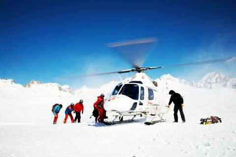 Heli-skiing Stock Photos