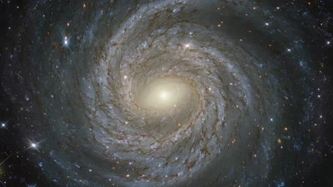 Helical galaxy spiralling trails of hot gas, nebulae and stars Video stock 154430075