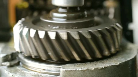 Helical gear rotating inside a car transmission mechanism Stock-Footage 318269085