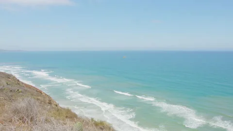 Helicoper flying over the ocean Video stock 188921899