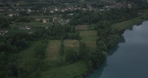 Helicopter aerial shot over fields, gloomy day Stock Footage 103898702