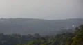 Helicopter airtanker spray against ferocious fire HD Footage