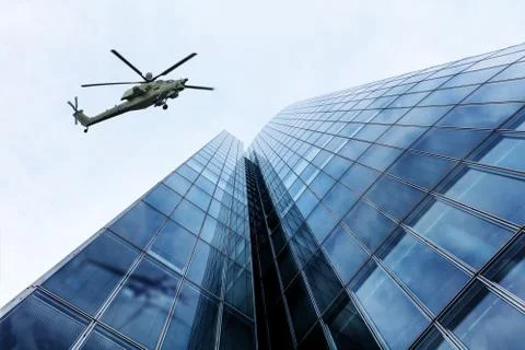 Helicopter and Skyscraper Stock Photos