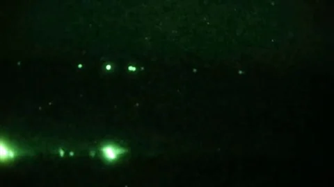 Helicopter attack with missiles on target at night Video stock 120843617