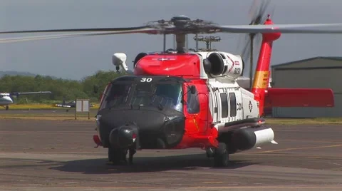Helicopter with blades slowing down Stock Footage 61894604