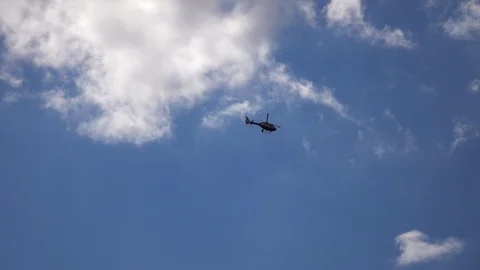 Helicopter in blue sky. Stock Footage 98416458