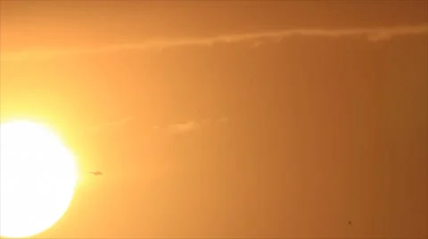 Helicopter from bright sun's disc Stock Footage 46414643