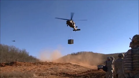 Helicopter carrying container during one station unit training - 2015 Stock Footage 105794293
