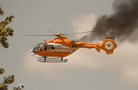 Helicopter crashing. Engine problems. Stock Photos