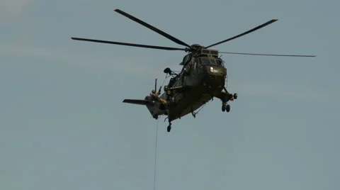 Helicopter crew rescuing soldier Stock Footage 41342949