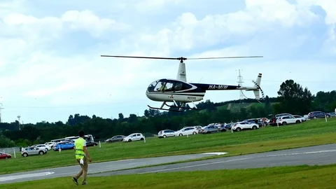 Helicopter Descends to the Ground Stock Footage 94694719