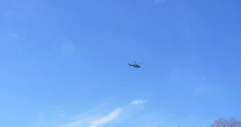 Helicopter in the distance on a blue sky Duluth Minnesota Cinema 4K Stock Footage 87797989