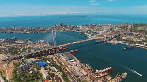 Helicopter ( drone, quadcopter ) flies over the coastal city, the sea, houses  Stock Footage 92200684