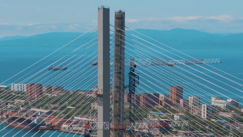 Helicopter ( drone, quadcopter ) flies over the coastal city, the sea, houses  Stock Footage 92200742