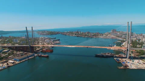 Helicopter ( drone, quadcopter ) flies over the coastal city, the sea, houses  Stock Footage 92200842