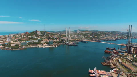 Helicopter ( drone, quadcopter ) flies over the coastal city, the sea, houses  Stock Footage 92200844