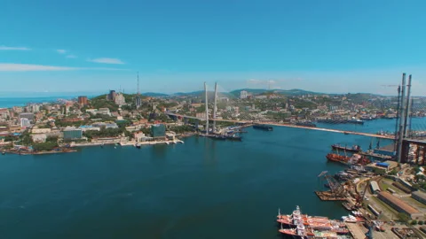 Helicopter ( drone, quadcopter ) flies over the coastal city, the sea, houses  Stock Footage 92200955