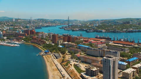 Helicopter ( drone, quadcopter ) flies over the city, the sea, houses Stock Footage 92201090