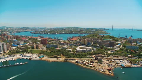 Helicopter ( drone, quadcopter ) flies over the city, the sea, houses Stock Footage 92201095