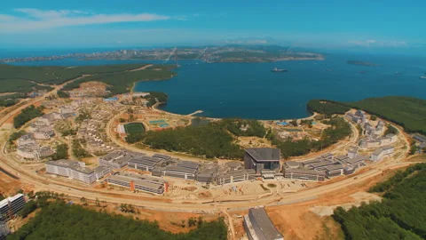 Helicopter ( drone, quadcopter ) flies over the city, the sea, houses Stock Footage 92201976