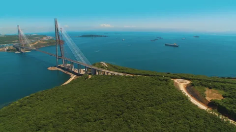 Helicopter ( drone, quadcopter ) flies over the coastal city, the sea Stock Footage 92202103
