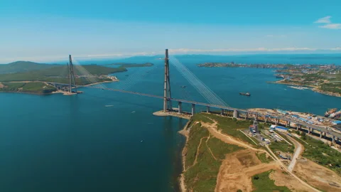 Helicopter ( drone, quadcopter ) flies over the coastal city, the sea, houses  Stock Footage 92202138