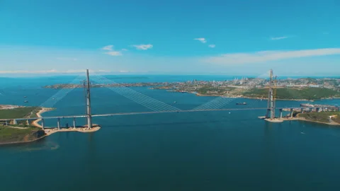 Helicopter ( drone, quadcopter ) flies over the coastal city, the sea Stock Footage 92208585
