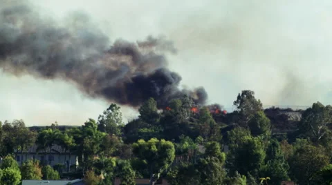 Helicopter dropping water on fire 3 Stock-Footage 54642558