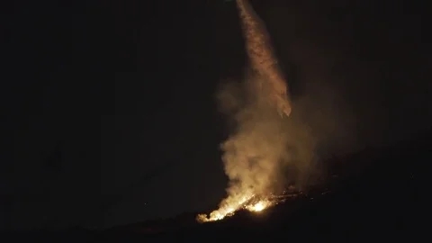 Helicopter Dumping Water on Wildfire 動画素材 79938599