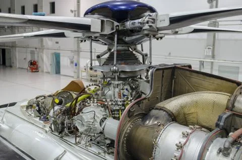 Helicopter engine exposed for maintenance in a Hangar Stock Photos