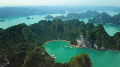 Helicopter epic tropical Halong Bay sharp natural rocks seascape Vietnam Sight  Stock Footage 106985373