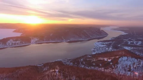 Helicopter epic winter Lake Baikal, Angara River sunset, Taltsy village Siberia  Stock Footage 317963228