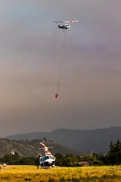Helicopter Fighting Wildfire Stock Photos