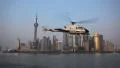 Helicopter filming in front of Shanghai Skyline, China Huangpu River Skyscrapers HD Footage