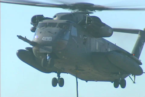 Helicopter flies off 01 Stock Footage 505479