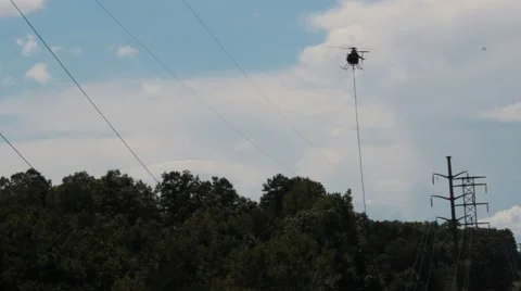 Helicopter flies above the tree line Stock Footage 41455826