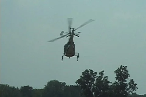Helicopter Flies Away 1 Stock-Footage 488587
