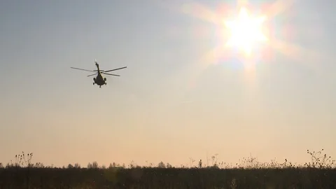 Helicopter flies away Video stock 120747492