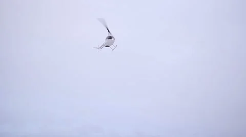 The helicopter flies Stock Footage 61766168