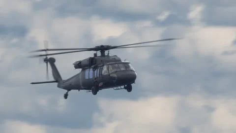 The helicopter flies high in the sky. Stock Footage 141523250