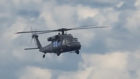 The helicopter flies high in the sky. Stock Footage 141527332