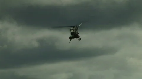 Helicopter flies out of screen Stock Footage 519970