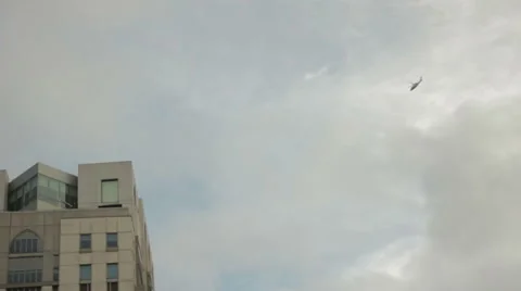 Helicopter Flies Over Building Stock Footage 46088479
