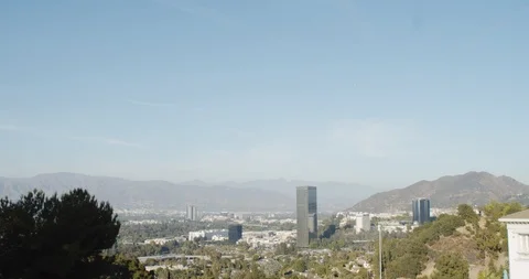 Helicopter flies over Burbank studios Stock Footage 122181444
