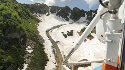 Helicopter flies over the mountains Stock Footage 73104832